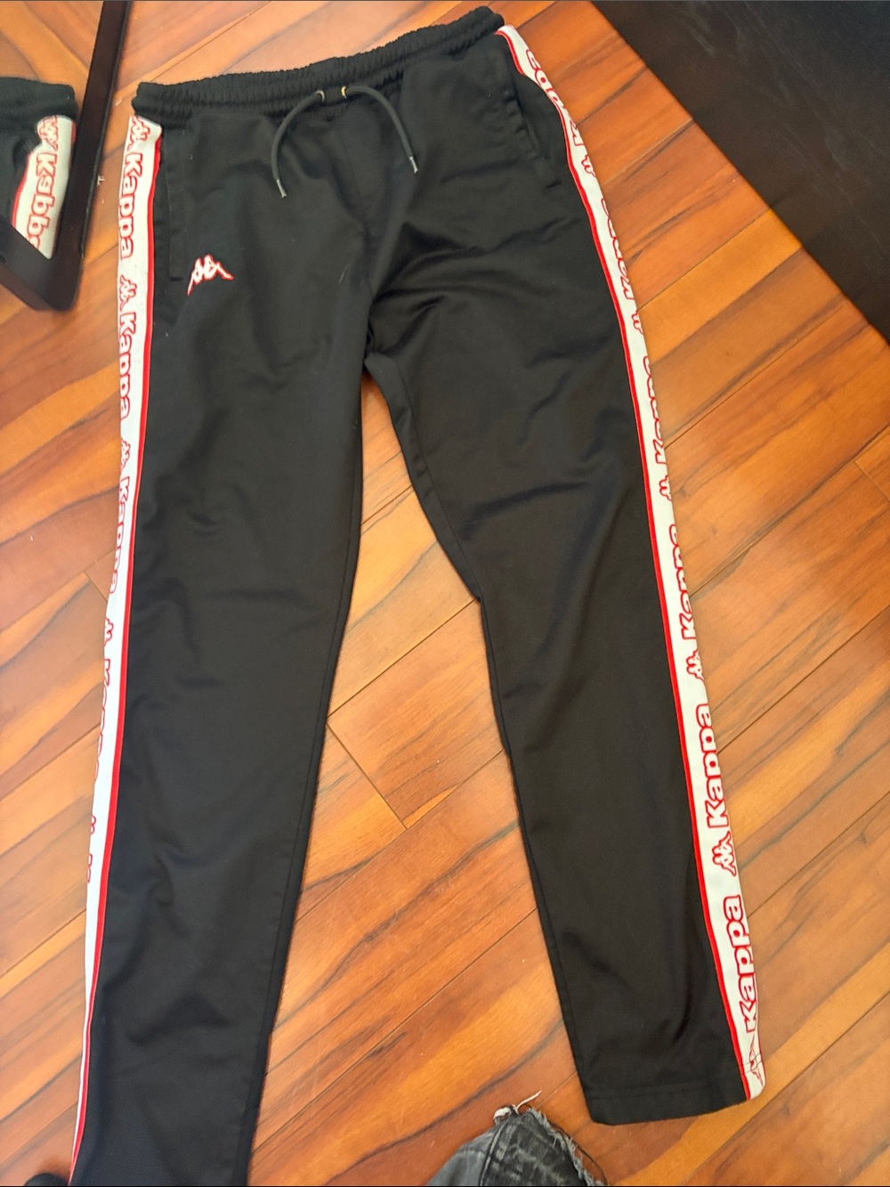 Kappa Black Joggers with Red and White Logo Tape